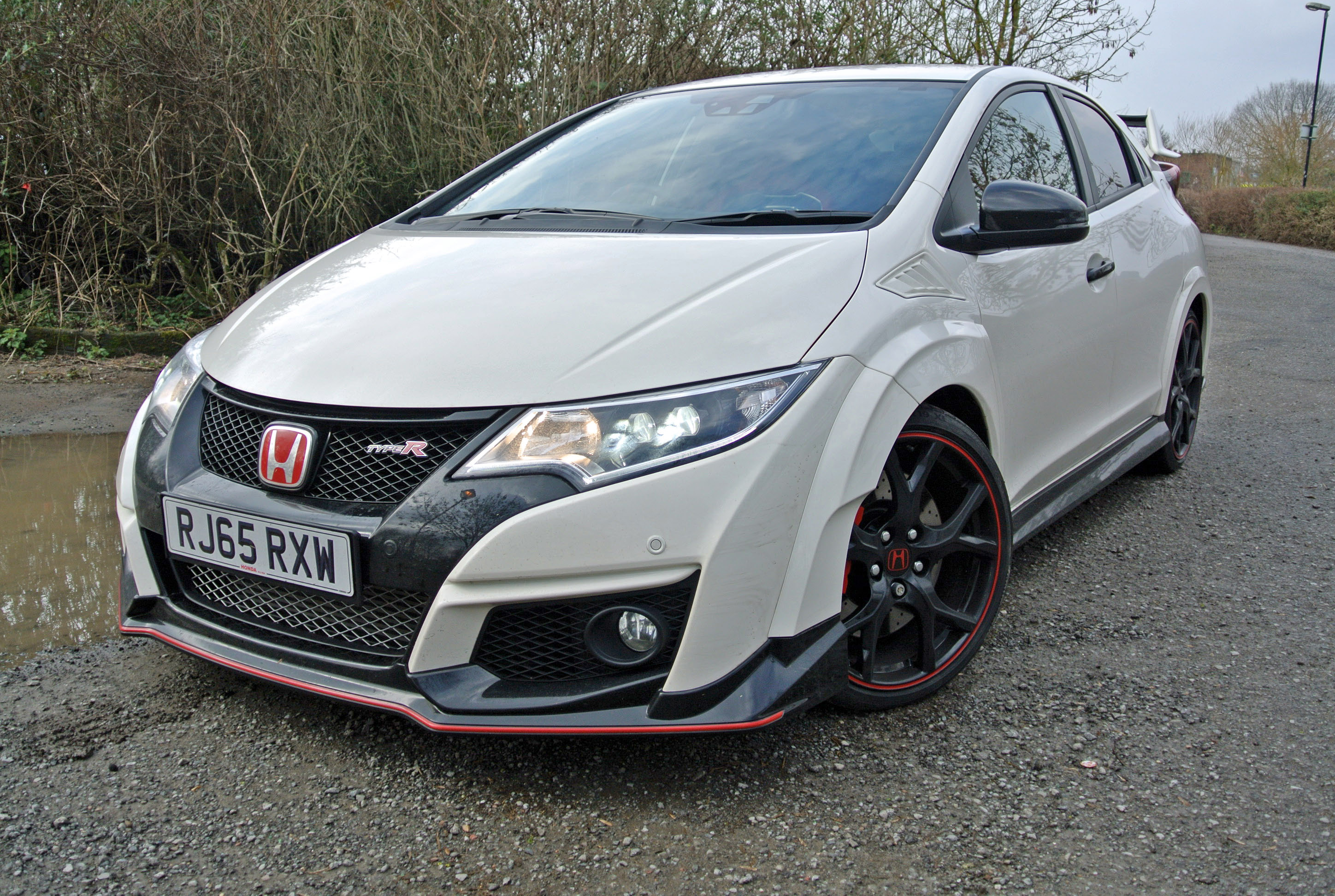 Type R gives with one hand, looks grim on the other